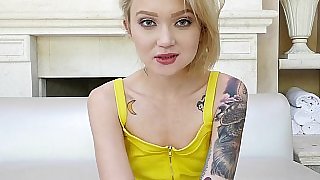 Making out with a petite tattooed blonde